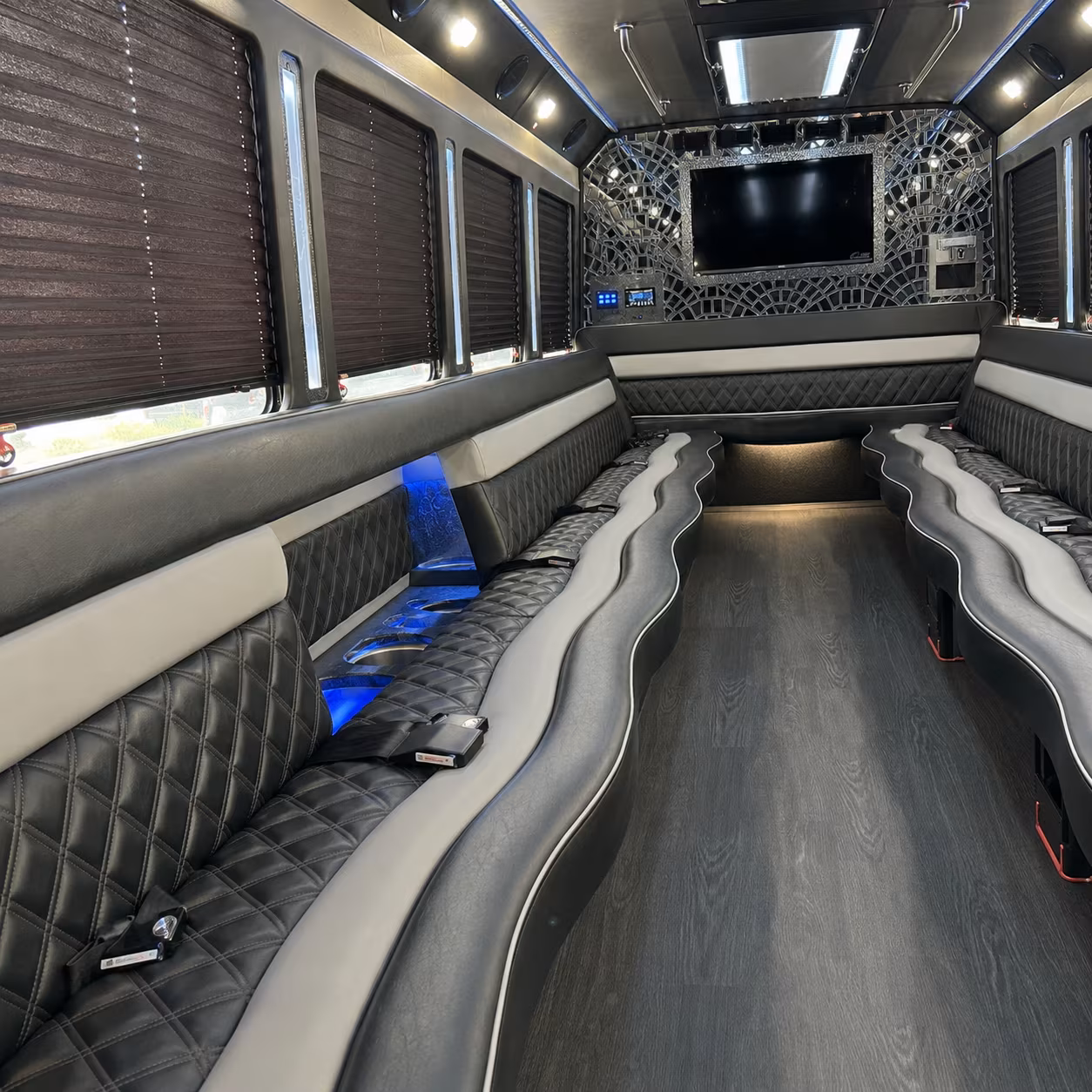Wedding guests seated inside a party bus serving San Jose